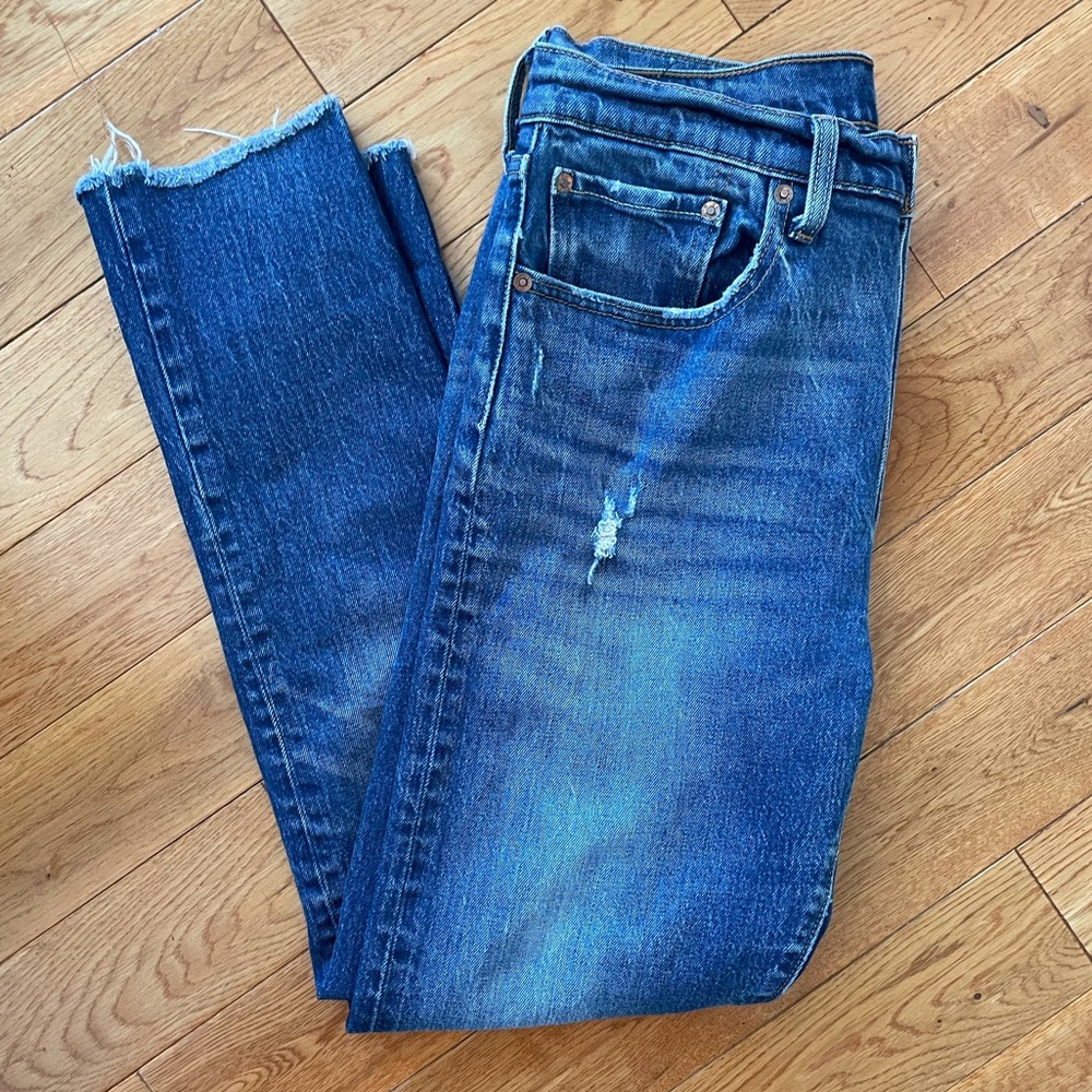 Levi’s 501 skinny distressed dark wash jeans